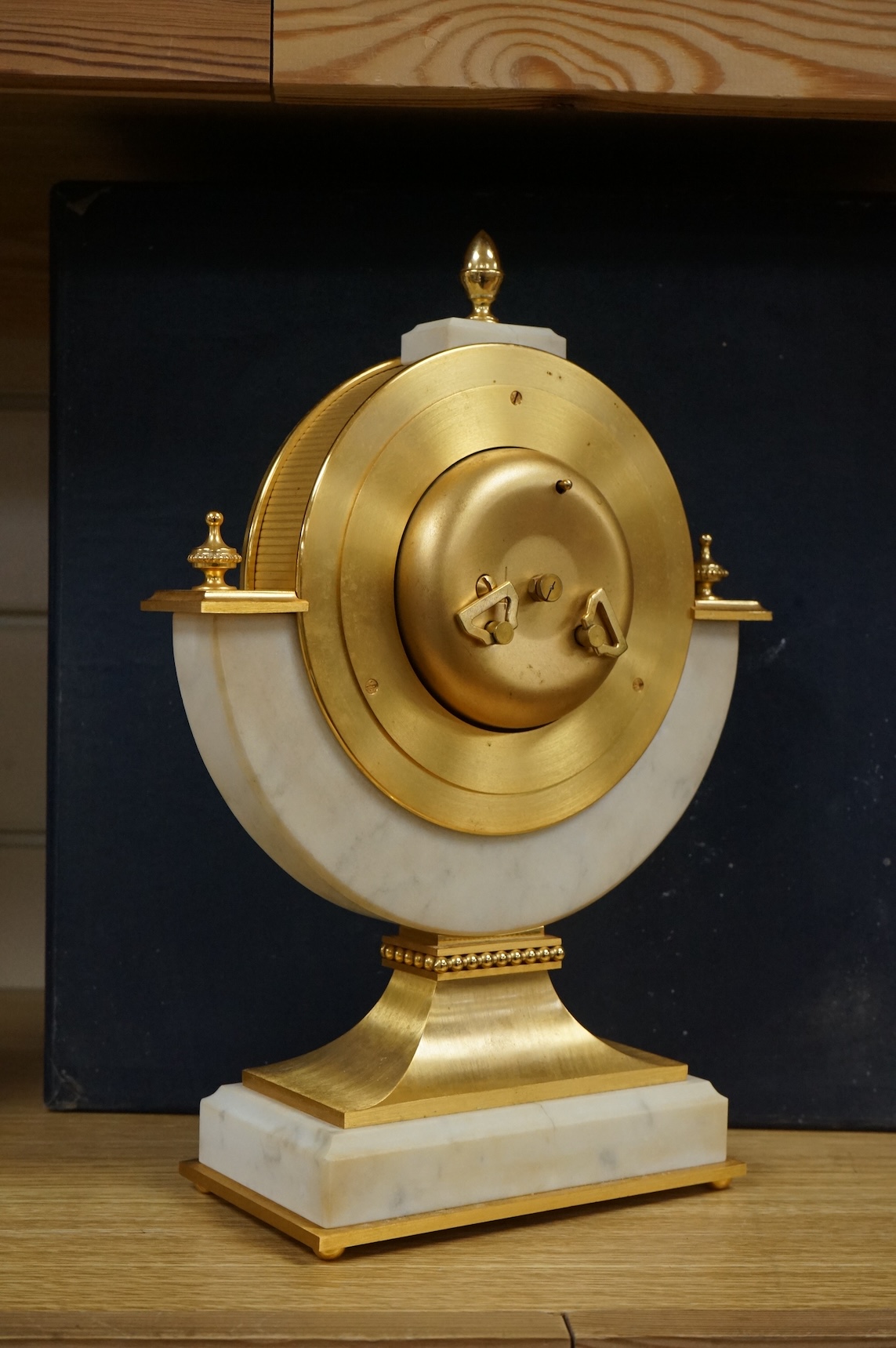 A 1970's Hour Lavigne white marble and gilt bronze mantle timepiece, boxed, 29cm high